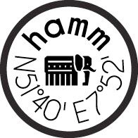 Rundes Logo mit dem Text 'hamm' und einem Elefanten sowie geografischen Koordinaten.